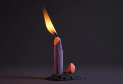 A single wooden matchstick standing upright with a small steady flame