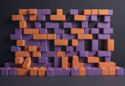 A short wall of interlocking toy building bricks stacked together with studs on top